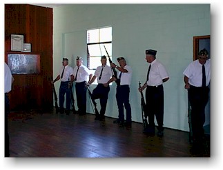 Checking the guns and rehearsing the orders beforehand in the Legion Hall