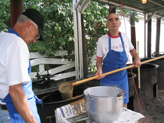 Neal Hart empties the kettle.