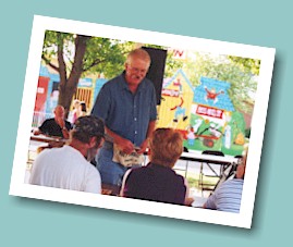 Gary Beard helps with the Bingo tables. His birthday, Sept. 7th, often falls on one of the days of the Burgoo.