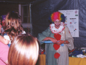 Clown making balloon creatures