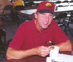 Jim Phelps enjoys a bowl of burgoo.