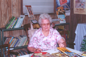 Louise Schroeder volunteers at the Village Library annual book sale.