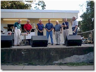 Gerald Beard (far right) introduces the members of the Arenzville Village Board who are present to receive a check for a grant from the State. From left, Ross Houston, Rep. Rich Myers, Ron Kershaw, Fred Blankenship, Dean Stock and Mayor Don Cates.