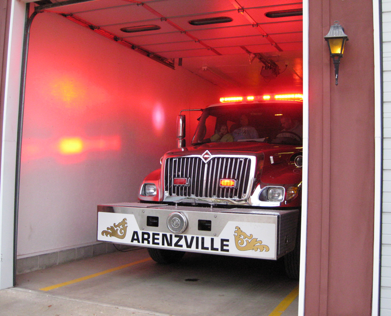 The Arenzville Volunteer Fire Department, ready to depart and meet the returning champions.