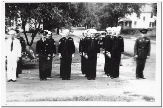 Men from the Navy and Marines line up prior to the parade