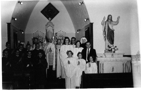 Bishop William O'Connor, with a Confirmation class, around 1961. (Some of the confirmands in this photo are Bill Parks, Chris Clark, Drew Clark, Steve Joy, Frank Dober, Mike Carrigan, Sarah Joy, Sara Clark, Ann Dober, Joan Carrigan and Karen Busen.)