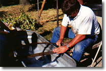 Man cleaning parts