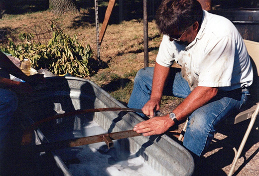 man cleaning te paddles